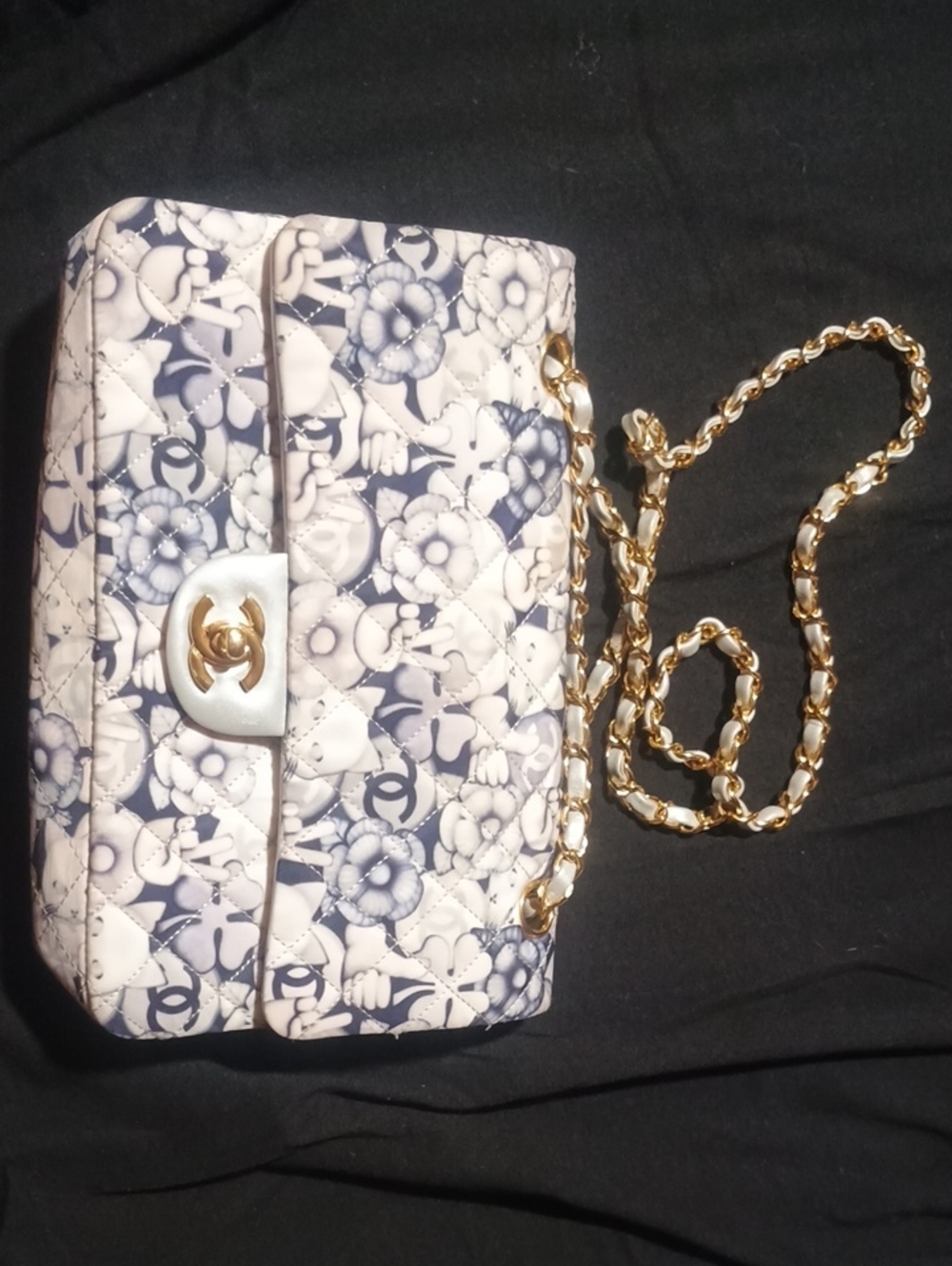 CHANEL Quilted Floral Crossbody Bag in Navy and White with Gold Chain